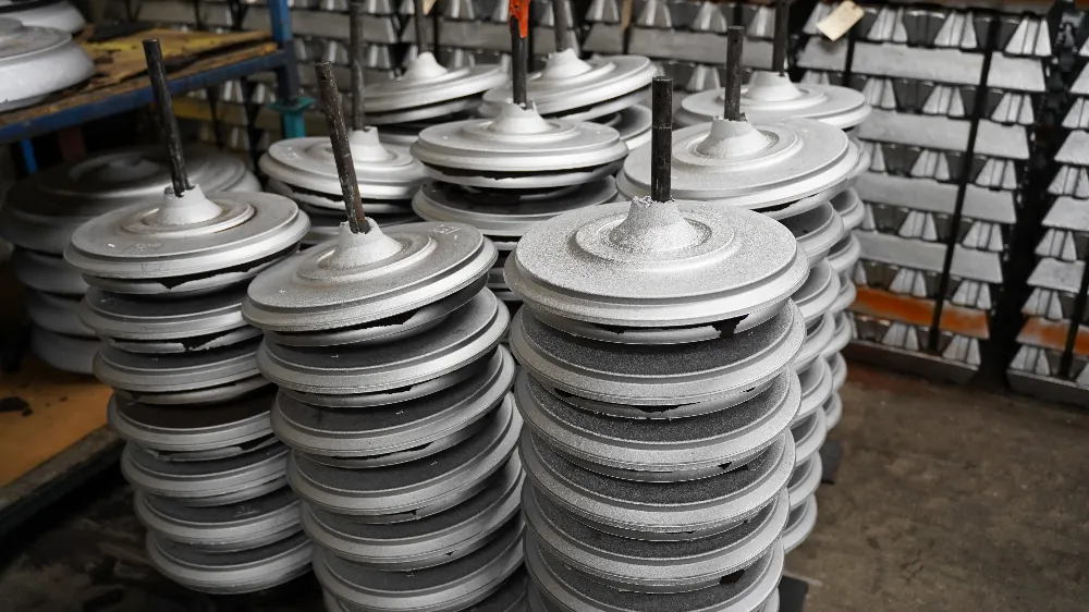 Stacks of cast aluminum torque converter housings